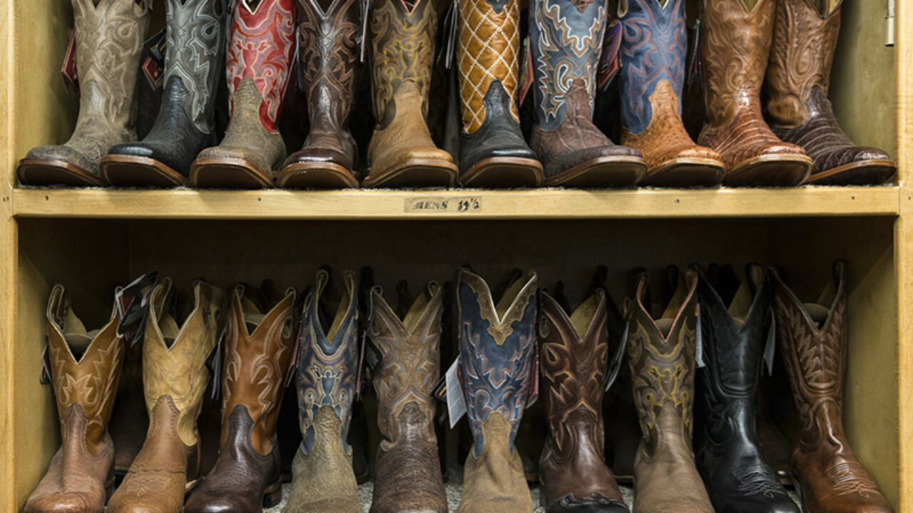 cowboy boots and slacks