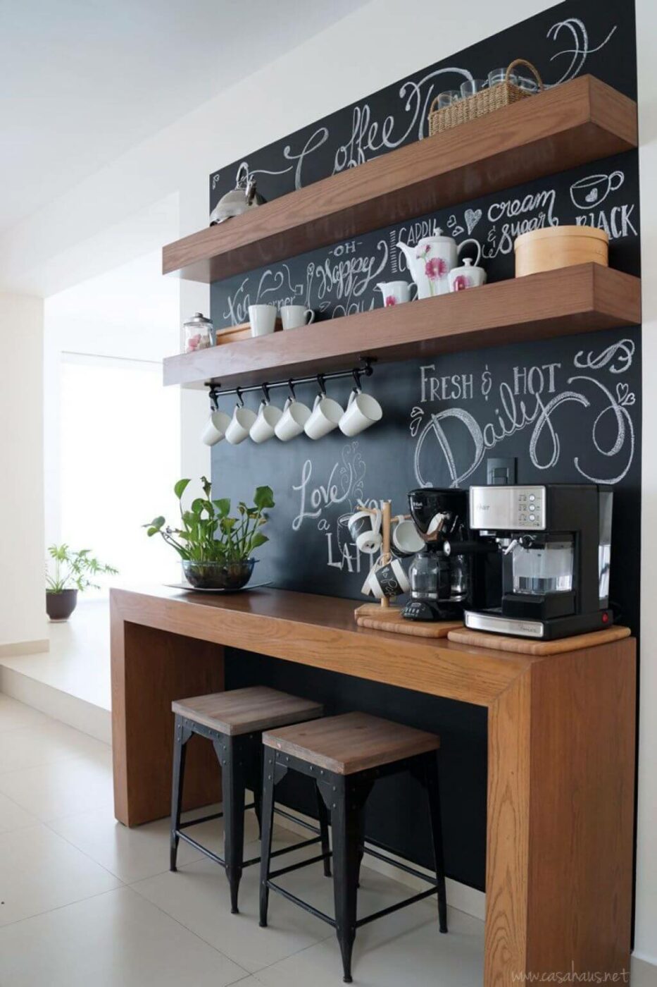 Modern Floating Shelf Storage with Chalkboard Backdrop