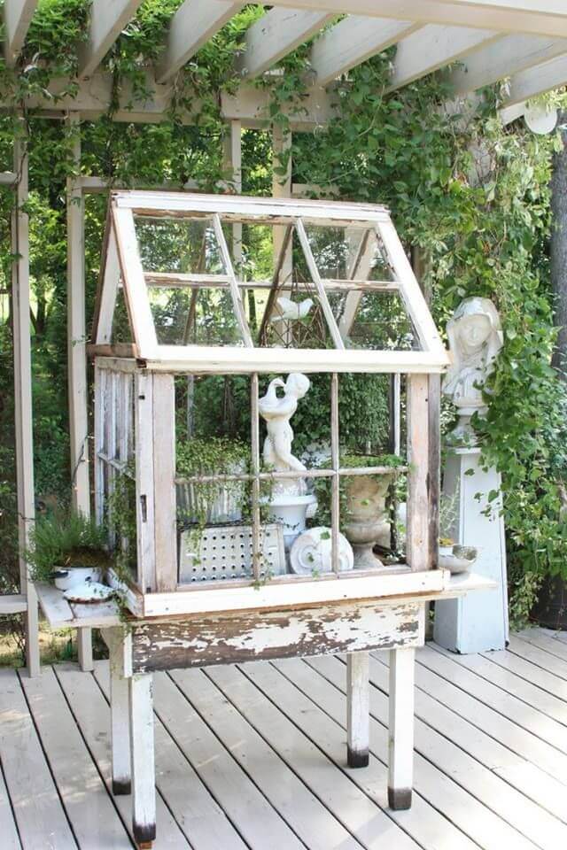 One Of The Repurposed Old Window Ideas Is A Terrarium