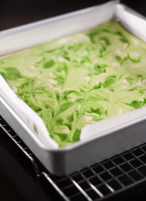 Key Lime Swirled Cheesecake Bars | Top 50 St. Patrick's Day Green Food - have fun with St. Patrick's Day and surprise your family and friends with these fun, festive green recipes!