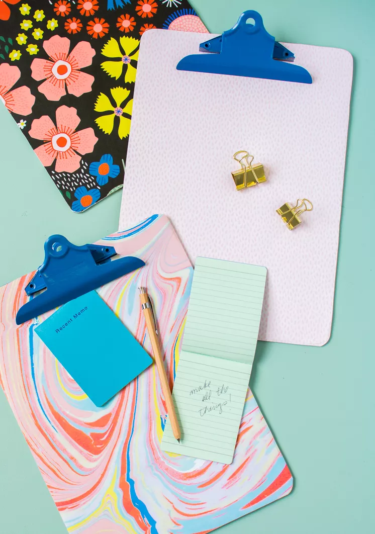clipboards covered with wrapping paper