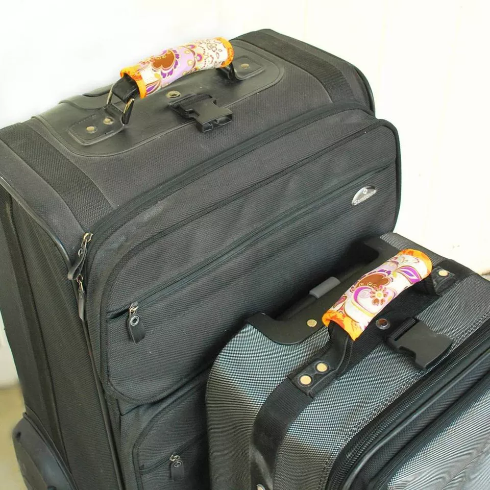  
DIY Luggage Handle Wraps from Blitsy