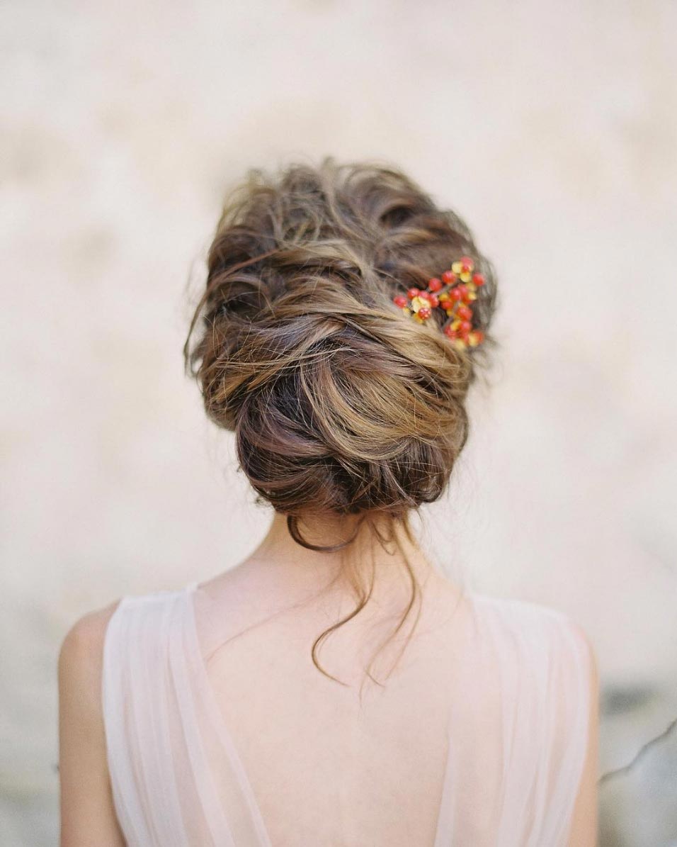 messy wedding updo thick wavy hair