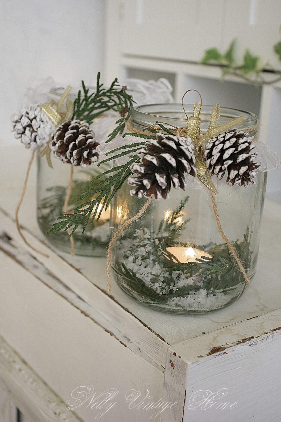 Tea light in a jar with greens | 25+ Winter decor crafts
