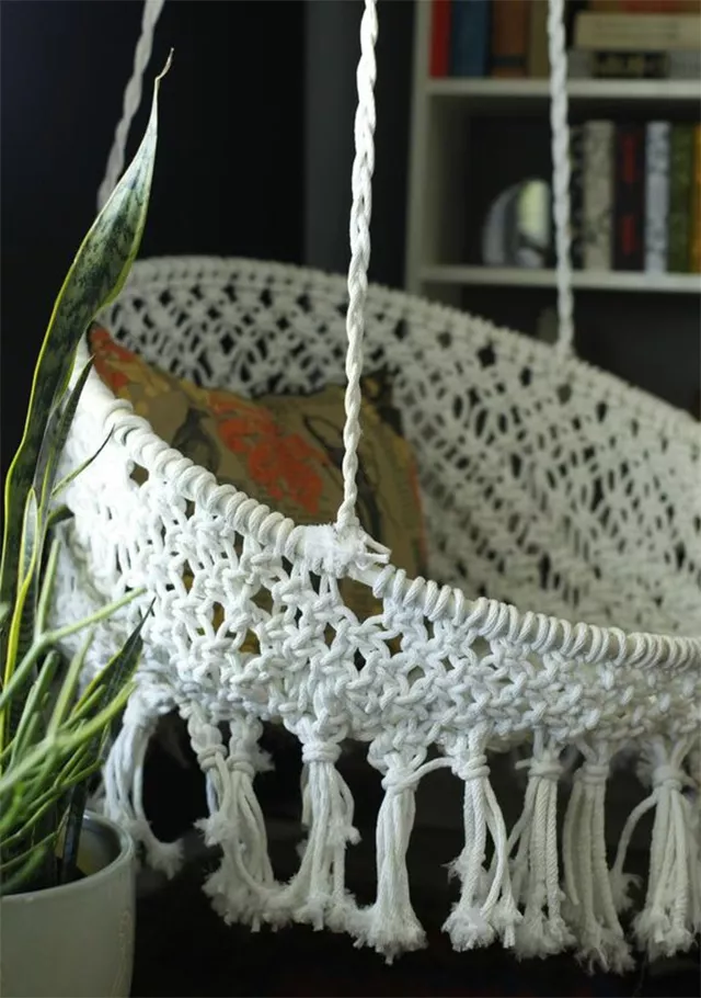 A hanging macrame chair