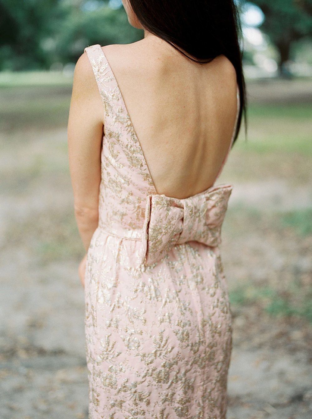 backless wedding dress with pink and gold