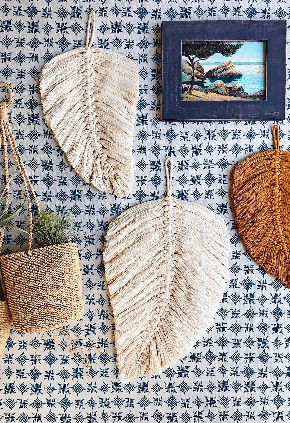 Macrame feathers hanging on a wall