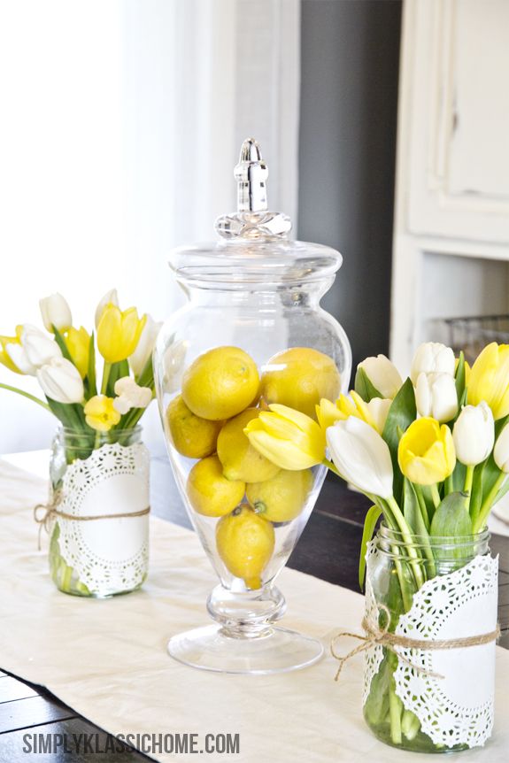 Pull together this easy lemon centerpiece decor with lemons in a jar and fresh tulips.