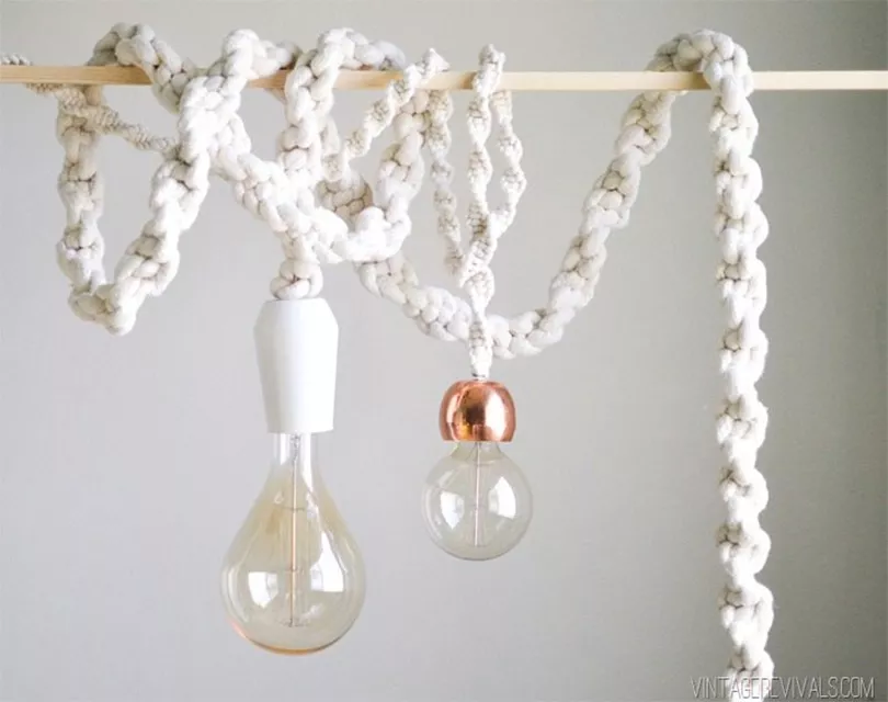 Macrame rope lights hanging from a dowel