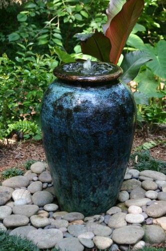 40+ Creative DIY Water Features For Your Garden --> Water Garden in Large Glazed Pot