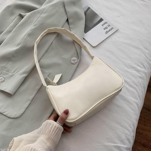 The Must-Have In The Winter Season - A White Bag